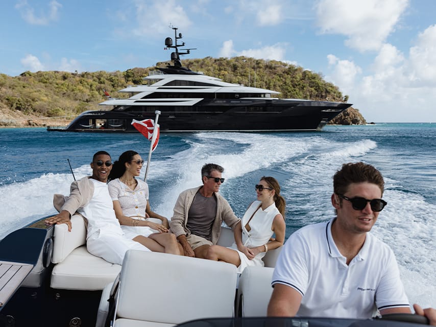 Two couples head out to explore the vibrant marine life of the Papagayo Peninsula, a highlight of private yacht vacations.