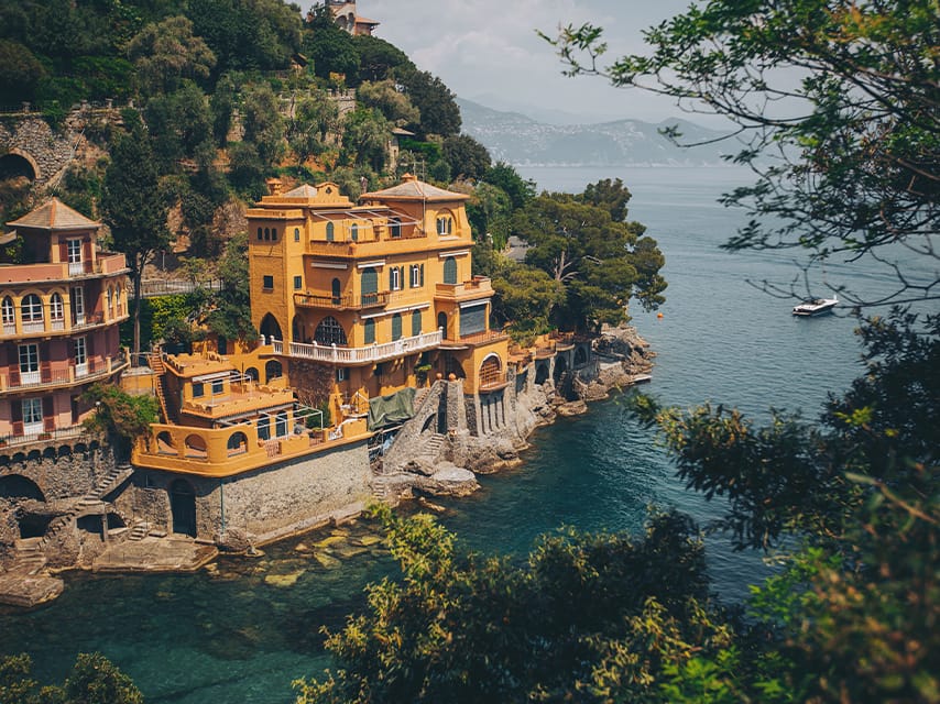 Elegant cliffside villas are iconic sights on a private yacht charter Italian Riviera experience.