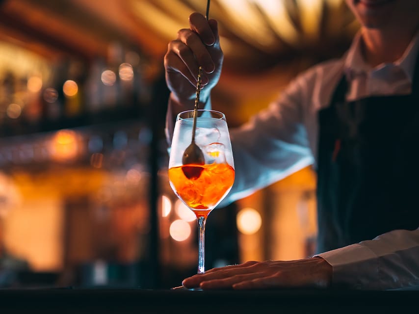 Enjoy vibrant sunset drinks at Naok Azur Corfu, a must-visit during your motor yacht charter, Corfu experience.