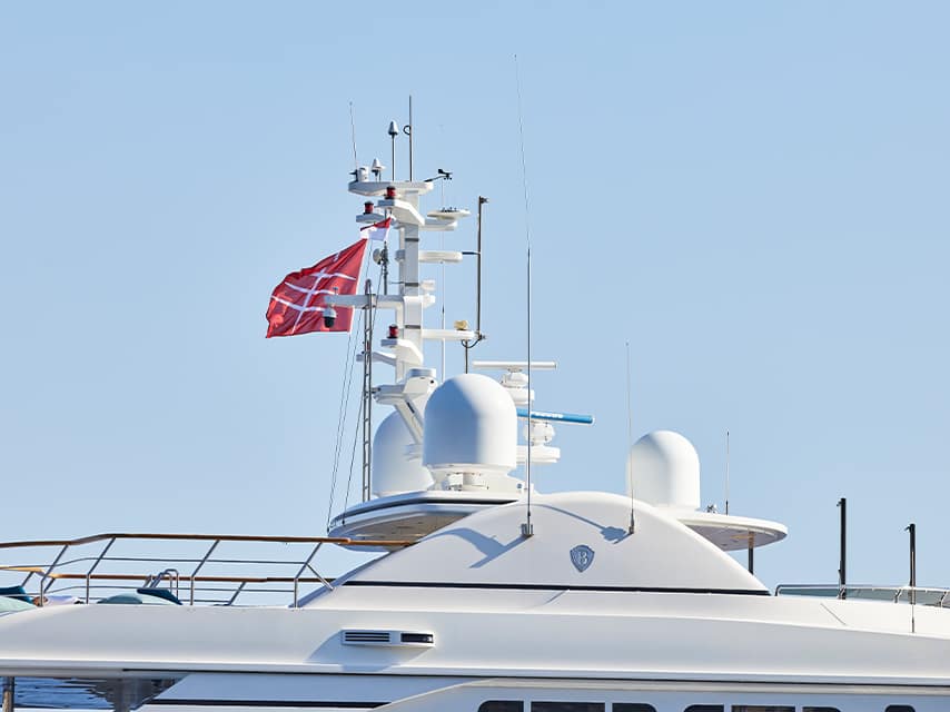 The Edmiston flag flies at the Cannes Yacht Show 2025, representing world-class charter and brokerage services.