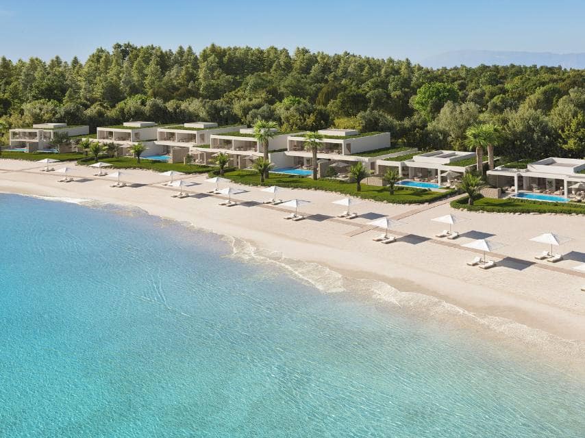 Private villas at Sani Beach Club Halkidiki blend nature with luxury for the ultimate beachside experience on your private yacht charter in Greece.