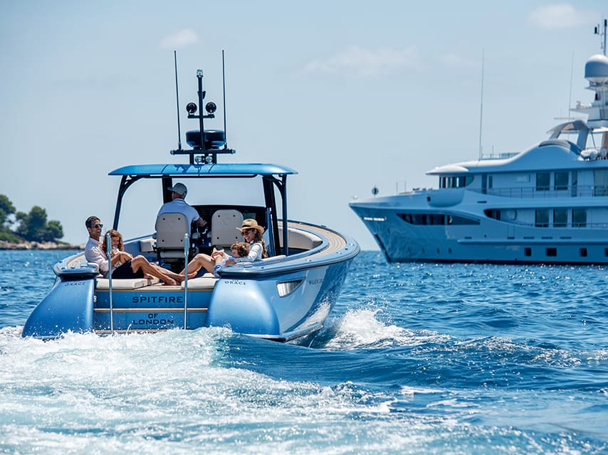 A family heads back to their yacht charter in Greece after a laid-back day at one of the best beach bars in Greece.