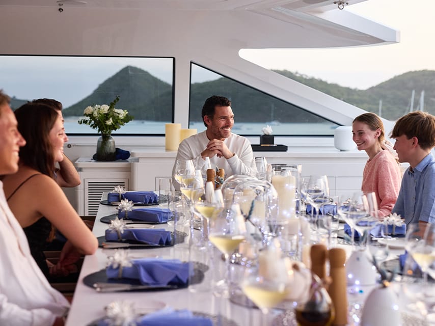 Family meal aboard a charter yacht