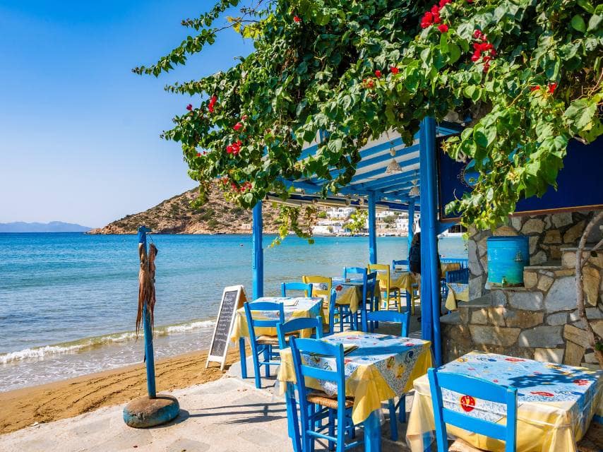 Seaside restaurant with turquoise waters on Kea Island, a hidden gem during private yacht holidays, Greek islands.