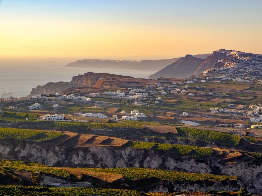 Private wine-tasting at a boutique vineyard in Santorini, a refined experience during a superyacht charter, Greek islands experience.