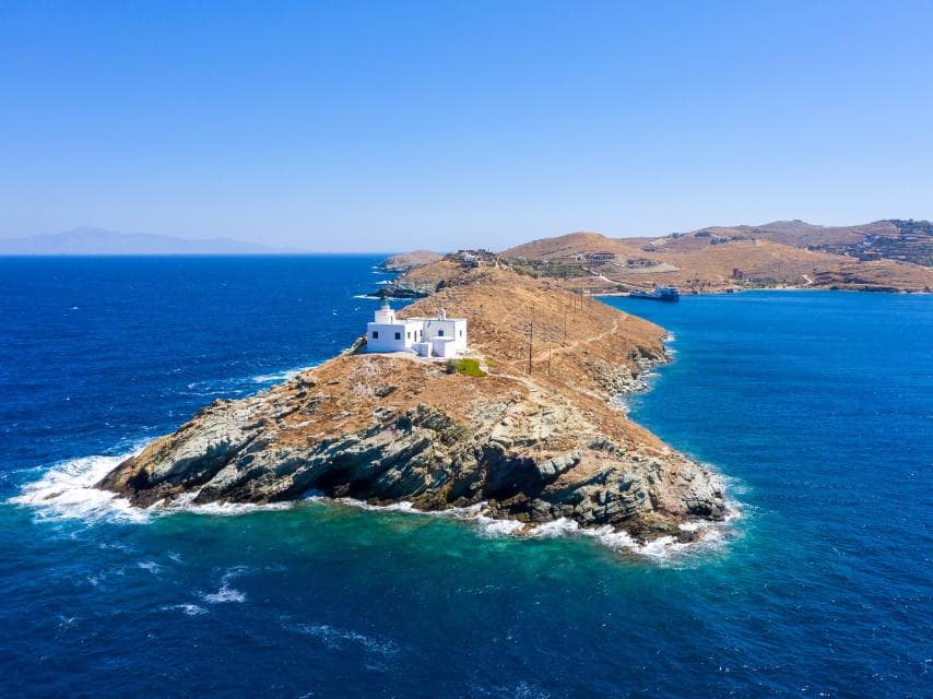 Monastery of Panagia Kastriani surrounded by the Aegean Sea, a must-stop during your luxury Greek island hopping itinerary, 10 days.