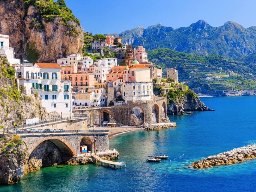 The vibrant Amalfi Coast cliffside views are a must-see stop on a Mediterranean Sea yacht charter.
