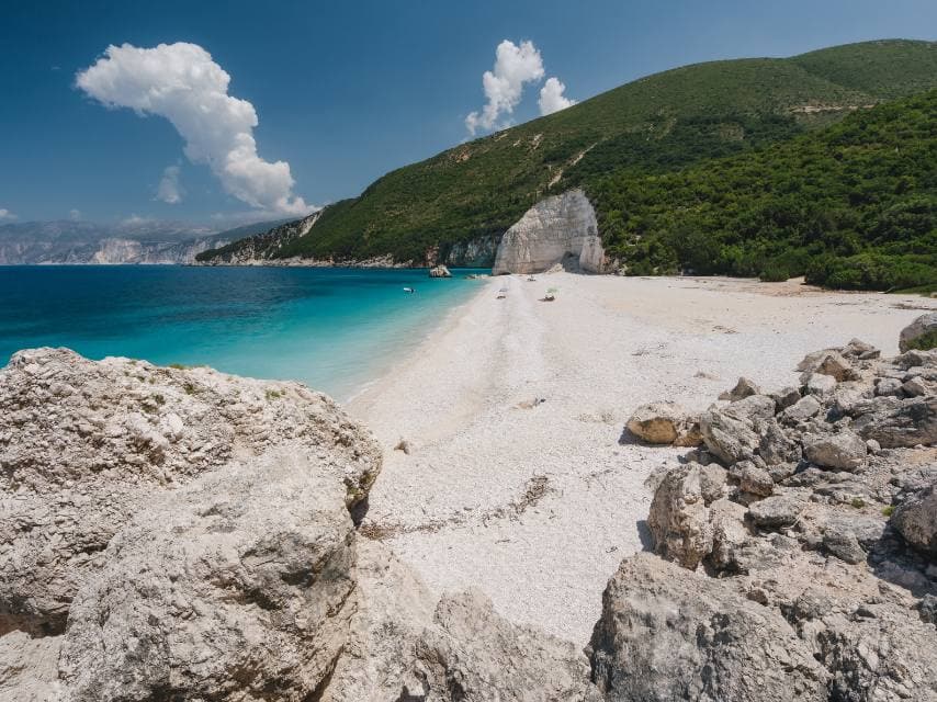 Discover the secluded beauty of Fteri Beach, a hidden stop on your Mediterranean superyacht charter.