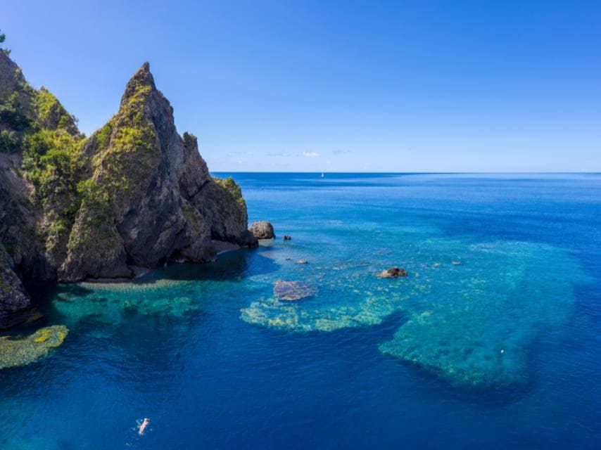 Volcanic underwater terrain in Dominica, a top spot for scuba diving in the Caribbean.