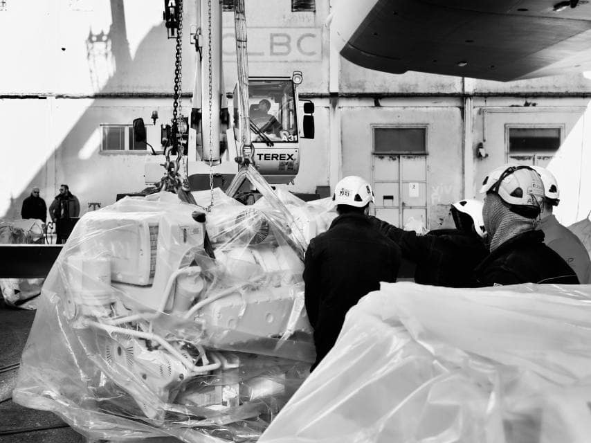 Working men refitting superyacht