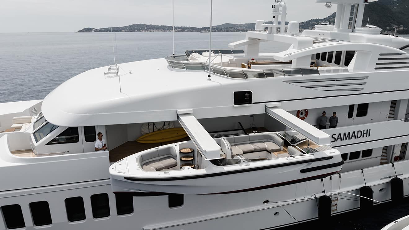 Yacht management services for the superyacht Samandhi, which features expansive decks and water toys.