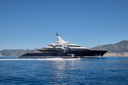 breakthrough yacht with tender running shot