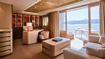 Elegant yacht interior with expansive ocean views, creating the ideal ambiance to sell a yacht.