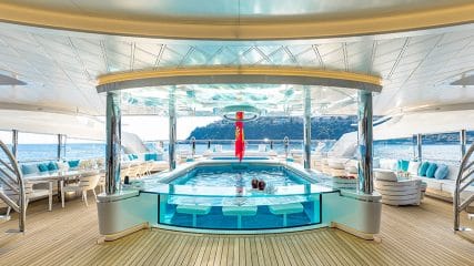 Luxurious deck with pool and ocean views, an integral part of the build a yacht experience.