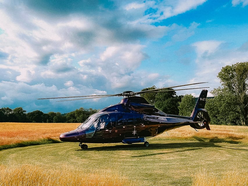 Edmiston branded helicopter landing at Goodwood
