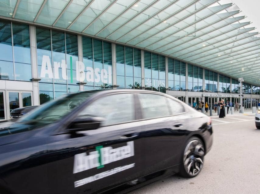 Branded car transporting guests to Art Basel Miami Vip events, ensuring a smooth and exclusive arrival experience.
