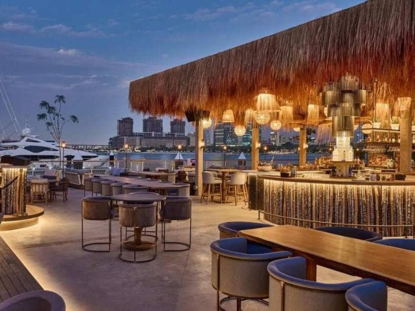 Elegant seating at Nobu’s sets the tone for a refined Abu Dhabi luxury yacht charter evening.