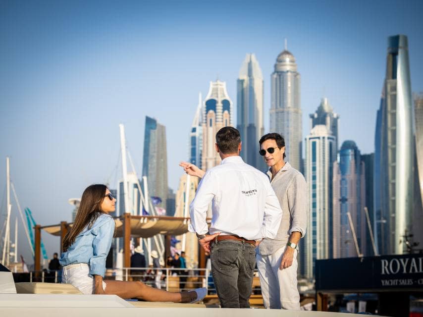 Brokers chatting at Dubai International Boat Show