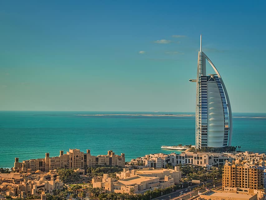 The iconic Burj Al Arab rises from Dubai's coastline, a stunning backdrop for the Dubai Boat Show, dates 19-23 Feb. 2025.