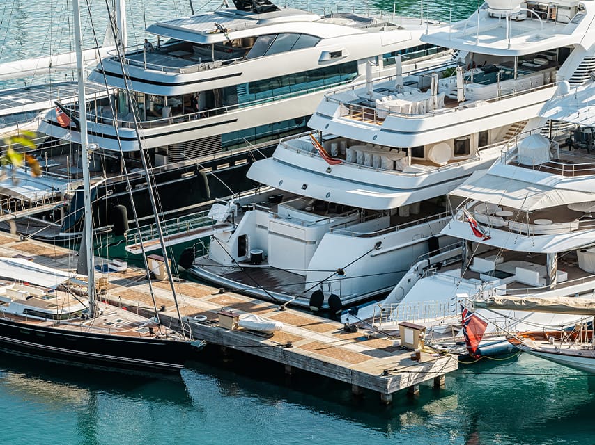 Edmiston superyachts yachts dockside, available for luxury yacht rental, Miami Yacht Week's most exclusive accomodations.