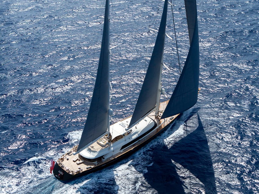 Aerial view of Asahi, a stunning sailing yacht available for luxury yacht charter in St Barths Regatta season with Edmiston.