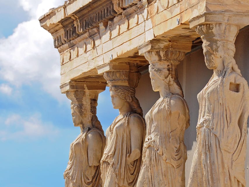 Four greek statues serve as pillars in the Erechtheion in ancient Athens. Guided tours can be arranged by Edmiston’s knowledgeable Greek yacht brokers.