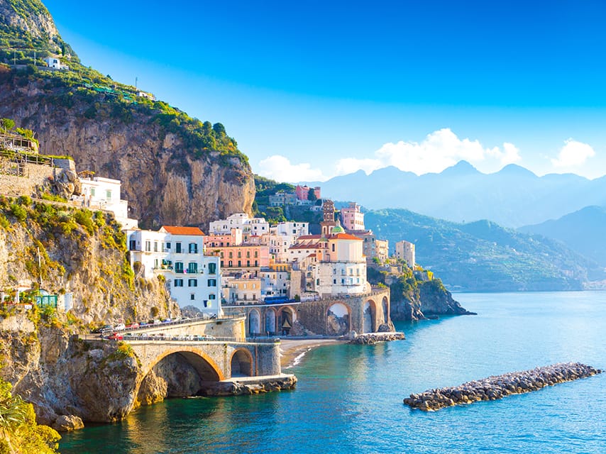 Cliffside villas and lemon groves line the coast, best viewed on a private yacht Amalfi Coast charter.