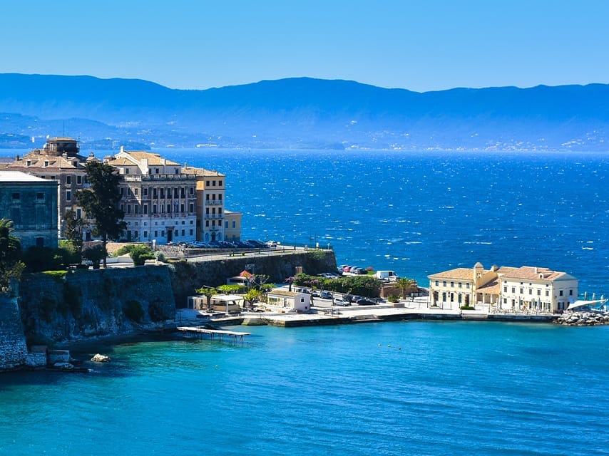 A pristine bay in Corfu is perfect for a morning swim during a luxury yacht charter Ionian experience.