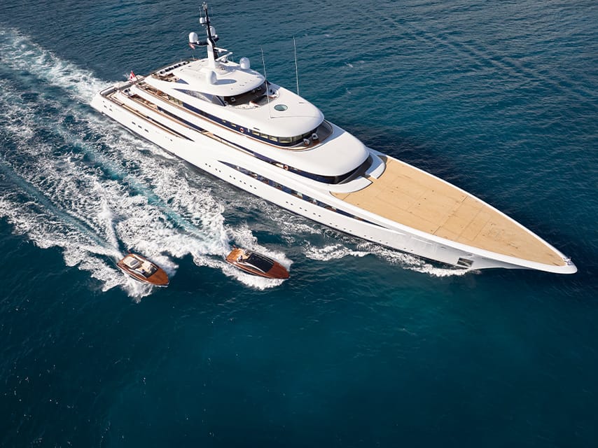 Superyacht with chase boats