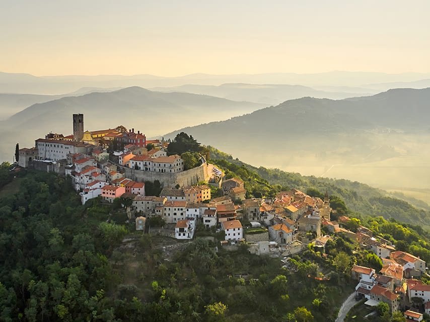 Aerial view of Motovun, an ideal stop to explore the best wineries in Istria during a private yacht charter, Croatia.