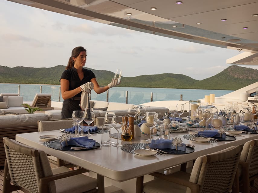 Stewardess polishing glass