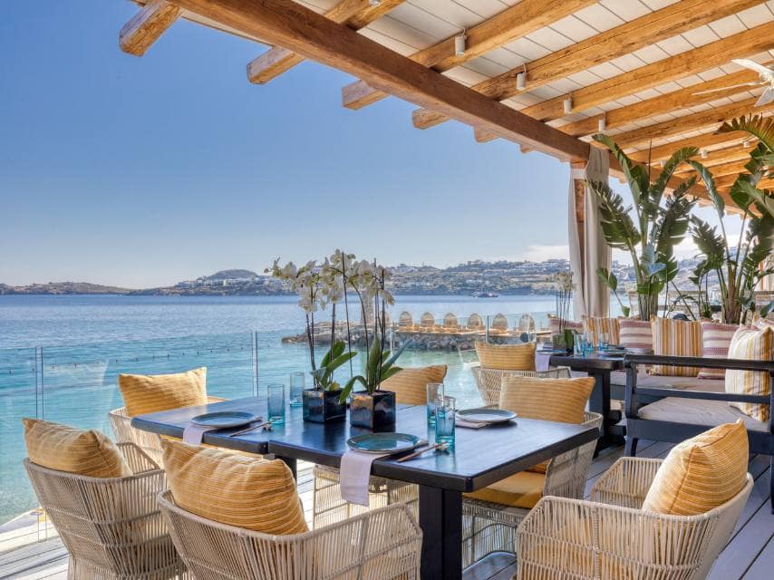 Evening ambiance at Buddha Bar with stunning views, capturing the glamour and glitz of the best way to visit Greek islands, by luxury yacht charter.