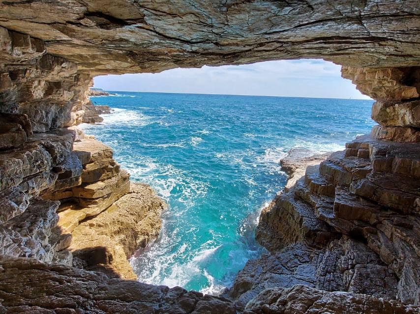 Beneath rocky cliffs, caverns overlook the oceans offering breathtaking views for Croatia yacht charter guests.
