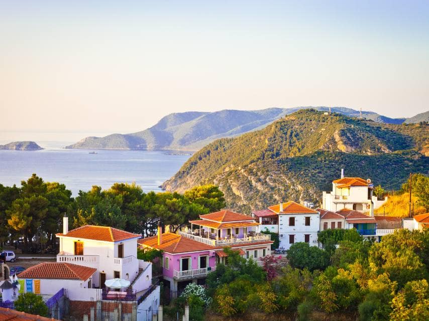 The hidden village of Loutro, only accessible by sea, is a peaceful gem to explore on your luxury Mediterranean yacht charter.