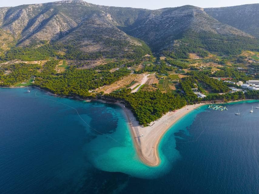 The Golden Horn of Croatia — Zlatni Rat is the most beautiful beach in Croatia, ideal for a mega yacht charter stop.