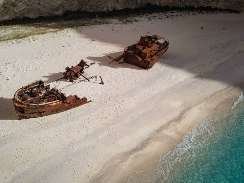 Explore the iconic MV Panagiotis shipwreck at Navagio Beach during your Mediterranean superyacht charter.