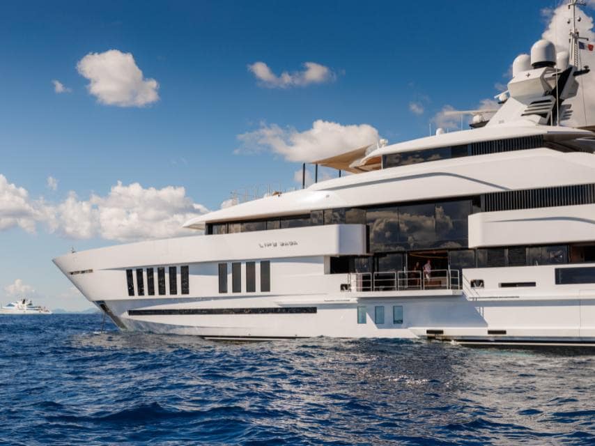 LIFE SAGA anchored in paradise during a luxury yacht charter in the Caribbean.