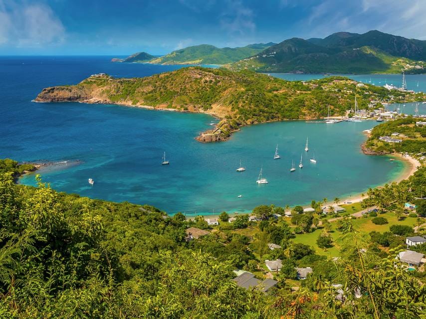 Christmas in the Caribbean yacht charter itineraries often include Shirley Heights, offering unforgettable views.