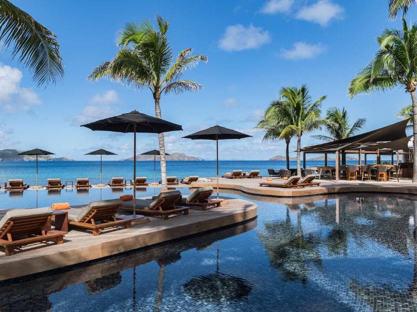 Pool and poolbeds with ocean views define the elegance of luxury Caribbean spas at Spa Sisley.