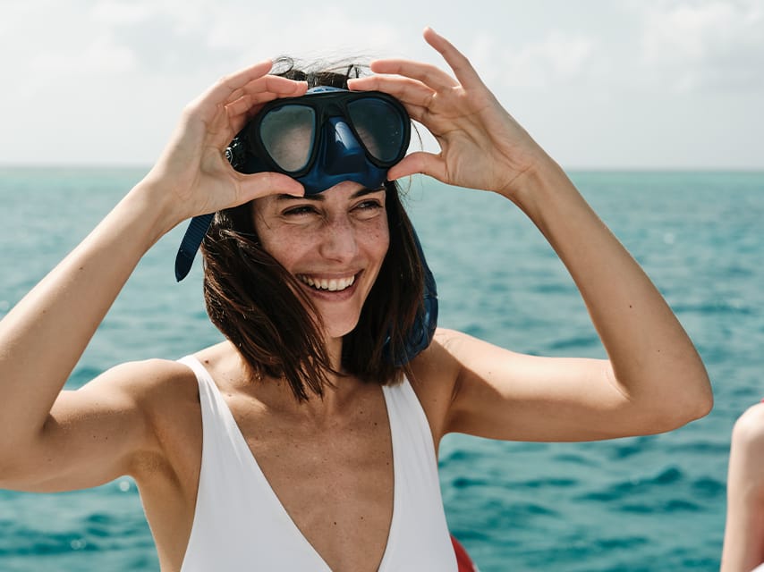 Charter guest snorkelling from a Sophia superyacht charter