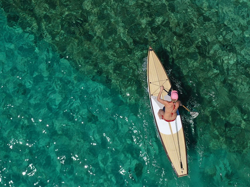Paddle boarding in the Bahamas on a luxury charter