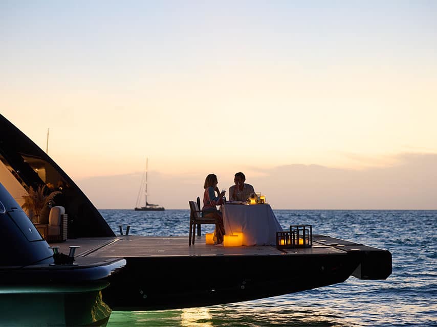 Romantic candle lit dinner onboard ARBEMA 72m luxury yacht