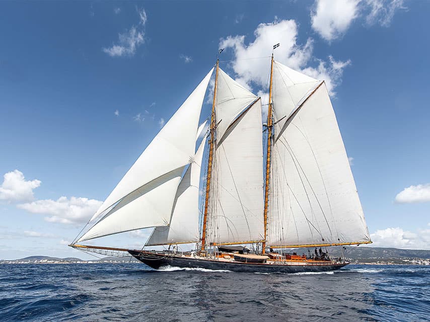 Exclusive yacht events during Les Voiles de Saint-Tropez feature the classic schooner Mariette of 1915 under full sail.