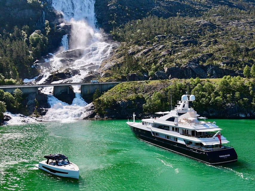 MYBA yacht charter show destination trends include the lush green cliffs and waterfalls of the Norwegian fjords for 2026.
