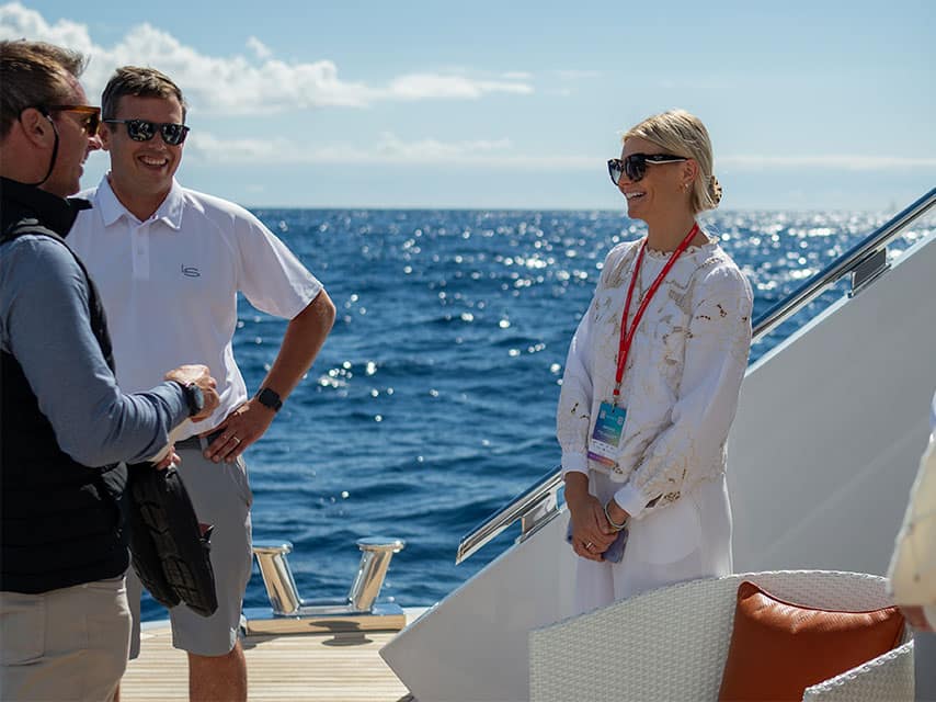 Edmiston brokers chatting onboard superyacht