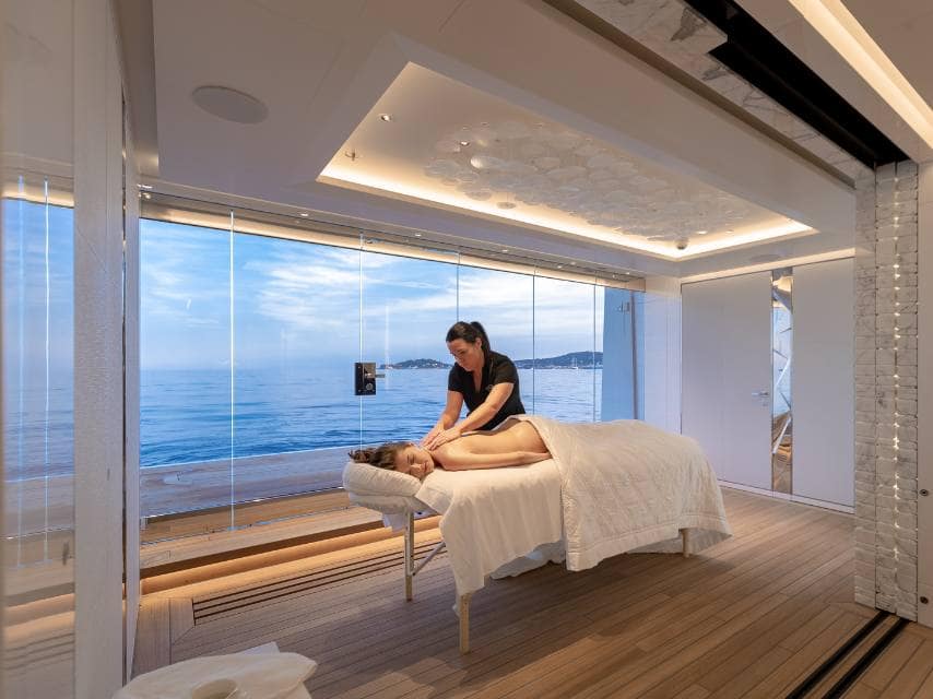 A private massage session aboard, with access to luxurious superyacht facilities tailored for ultimate relaxation.