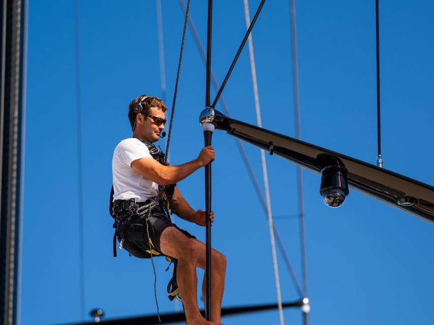 Crew abseiling a mast