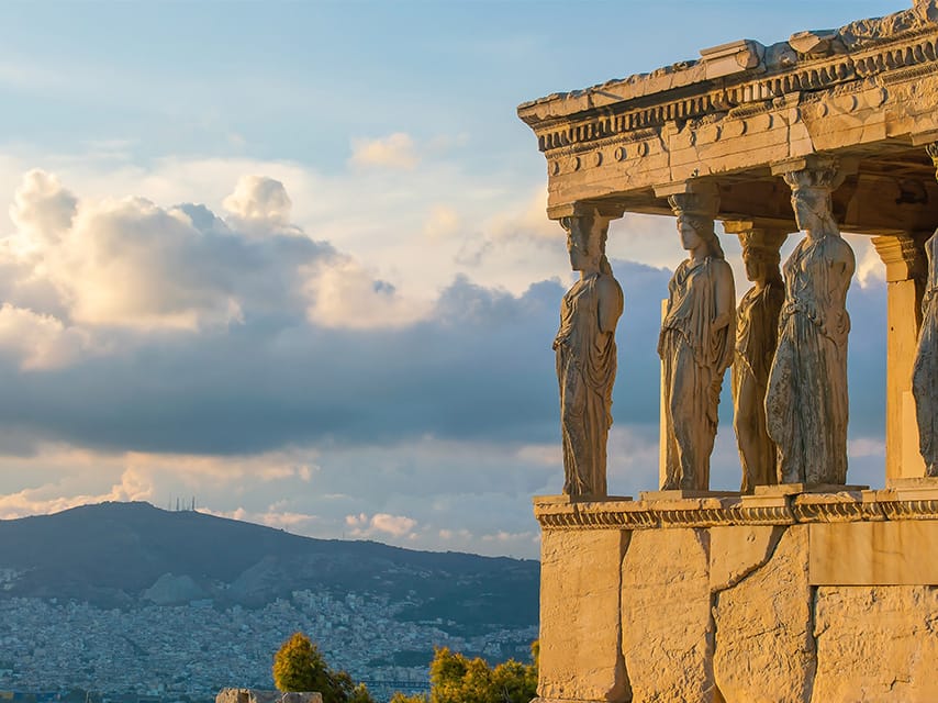 Athens yacht charter guests can visit the Acropolis, admiring the Erechtheion's caryatids above the skyline.