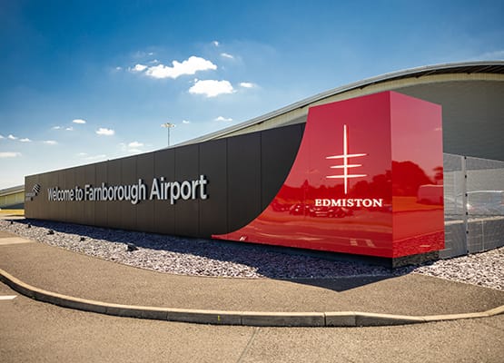 Edmiston & Farnborough Airport signs on display