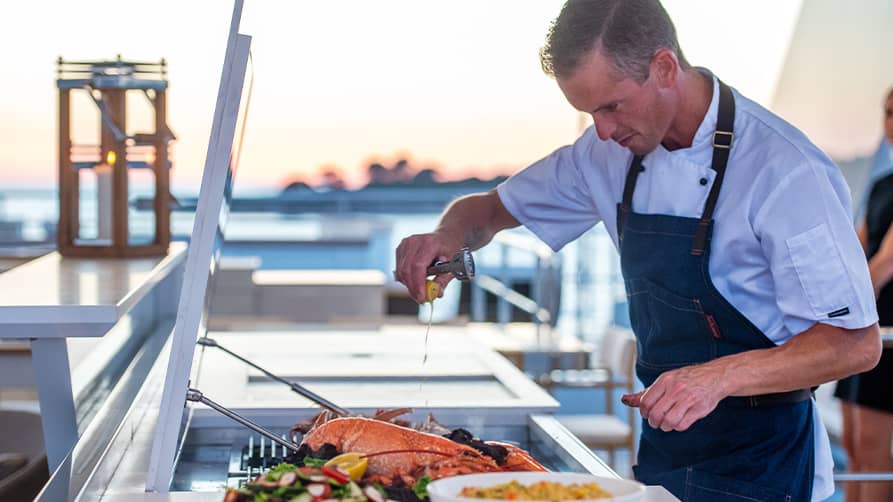 Chef leads a cooking class in French Riviera cuisine at the Riviera French Institute in Cannes—an excellent activity during your French Riviera yacht charter.